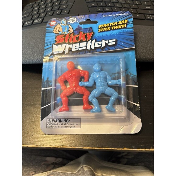 The Toy Network Sticky Wrestlers-Red & Blue-stretch and stick them NIP - Picture 1 of 4